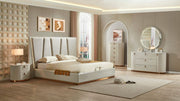 Modern bedroom with a bed, nightstands, and dresser.