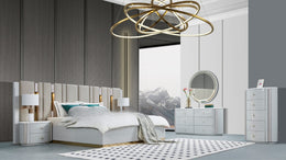 Modern bedroom with a large bed, nightstands, and a dresser.