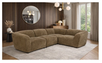Brown sectional sofa in a living room setting with decor elements.