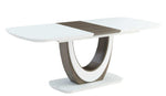 Modern dining table with a white top and brown circular base on a white background